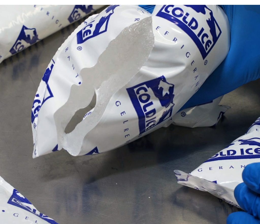 A sliced-open Cold Ice gel refrigerant pack revealing the frozen gel interior.